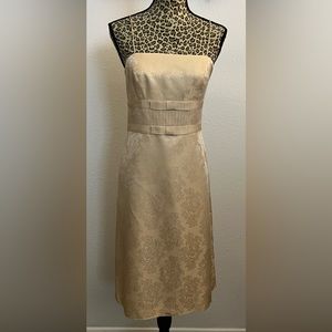 Classic empire waisted spaghetti strapped sister of the bride dress.